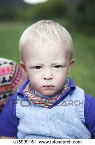 Close up of boys serious face View Large Photo Image Stock Image - Close up of boys serious face. Fotosearch