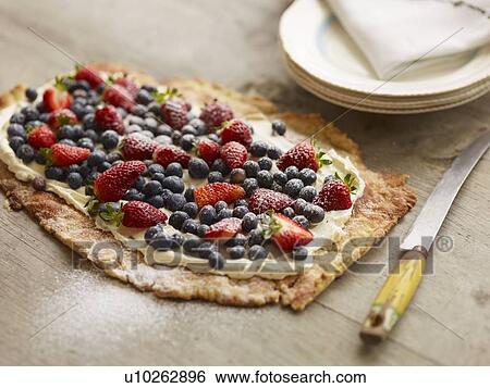 Close up of fruit and cream tart View Large Photo Image Stock Photograph - Close up of fruit and cream tart. Fotosearch