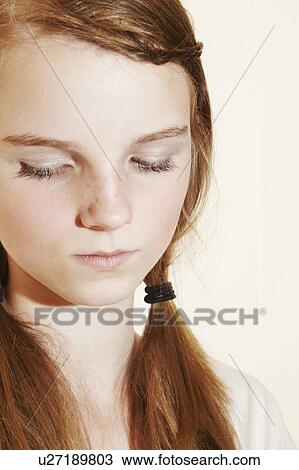 Close up of girls serious face View Large Photo Image Stock Image - Close up of girls serious face. Fotosearch