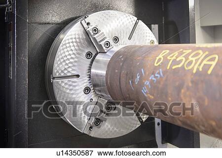 Stock Photo - Close up of industrial lathe. Fotosearch