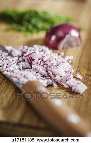 Stock Photography - Close up of knife and chopped onions. Fotosearch
