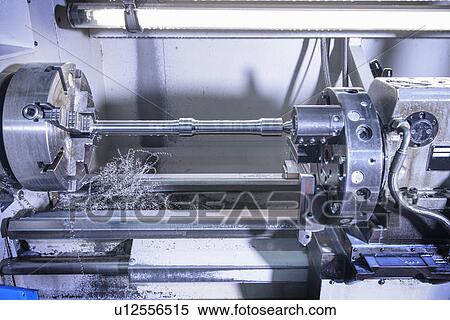 Stock Photography - Close up of machinery in factory. Fotosearch