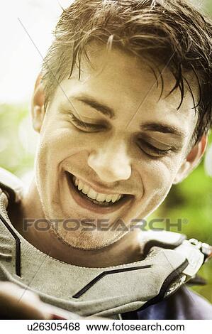 Close up of mans smiling face View Large Photo Image Stock Photo - Close up of mans smiling face. Fotosearch