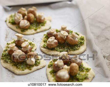 Stock Photo - Close up of mushroom pesto pastries. Fotosearch