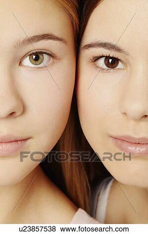 Stock Photo - Close up of teenage girls faces. Fotosearch