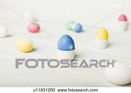 Colorful Easter eggs in egg cups View Large Photo Image Stock Image - Colorful Easter eggs in egg cups. Fotosearch