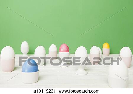 Colorful Easter eggs in egg cups View Large Photo Image Stock Image - Colorful Easter eggs in egg cups. Fotosearch