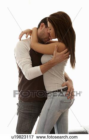 Couple hugging indoors View Large Photo Image Stock Photo - Couple hugging indoors. Fotosearch