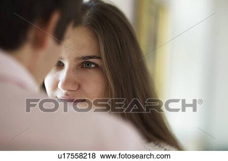 Couple looking into each others eyes View Large Photo Image Stock Photo - Couple looking into each others eyes. Fotosearch