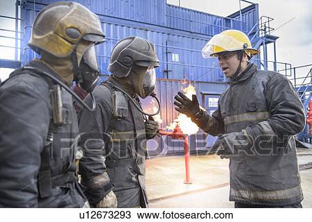 Firefighters in simulation training View Large Photo Image Stock Image - Firefighters in simulation training. Fotosearch