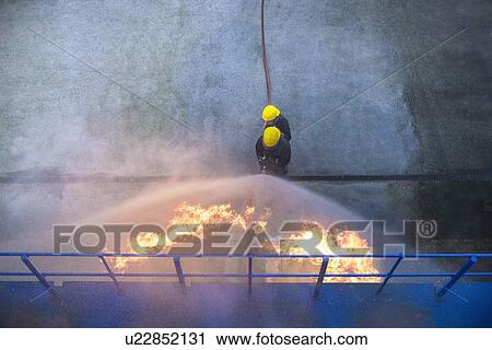 Firefighters in simulation training View Large Photo Image Stock Image - Firefighters in simulation training. Fotosearch