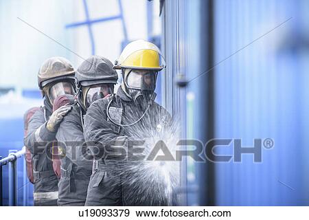 Firefighters in simulation training View Large Photo Image Stock Photo - Firefighters in simulation training. Fotosearch