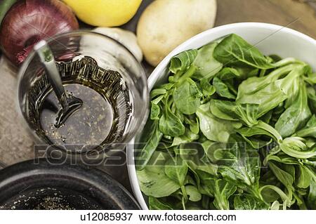 Leafy salad with dressing View Large Photo Image Stock Photo - Leafy salad with dressing. Fotosearch