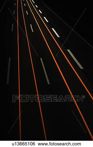 Long exposure view of traffic at night View Large Photo Image Stock Photograph - Long exposure view of traffic at night. Fotosearch
