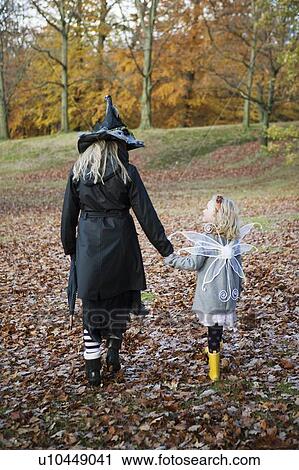 Mother and daughter in costumes View Large Photo Image Stock Image - Mother and daughter in costumes. Fotosearch