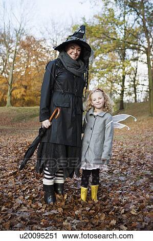 Mother and daughter in costumes View Large Photo Image Stock Image - Mother and daughter in costumes. Fotosearch