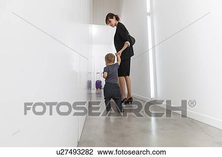 Mother returning from business trip View Large Photo Image Stock Image - Mother returning from business trip. Fotosearch