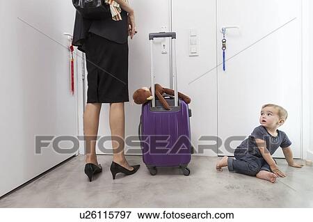Mother returning from business trip View Large Photo Image Stock Photo - Mother returning from business trip. Fotosearch