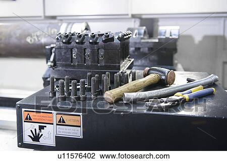 Nuts and bolts on industrial lathe View Large Photo Image Stock Image - Nuts and bolts on industrial lathe. Fotosearch