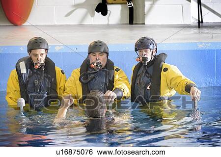 Oil workers learning survival strategies View Large Photo Image Stock Photograph - Oil workers learning survival strategies. Fotosearch
