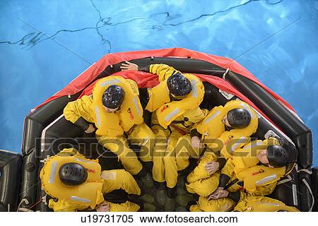 Oil workers learning survival strategies View Large Photo Image Stock Photography - Oil workers learning survival strategies. Fotosearch