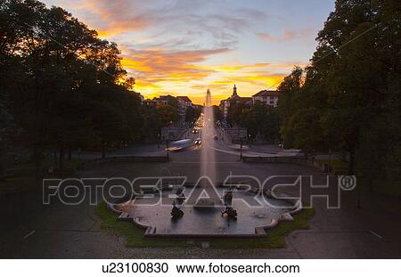 Ornate fountain in town square at dusk View Large Photo Image Stock Image - Ornate fountain in town square at dusk. Fotosearch