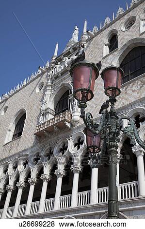 Ornate streetlamp and building View Large Photo Image Stock Photo - Ornate streetlamp and building. Fotosearch