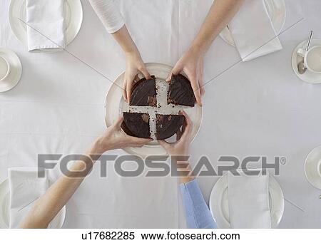 Overhead view of people sharing dessert View Large Photo Image Stock Photography - Overhead view of people sharing dessert. Fotosearch