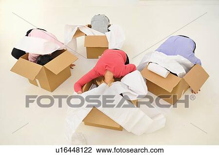 People with heads in cardboard boxes View Large Photo Image Stock Image - People with heads in cardboard boxes. Fotosearch