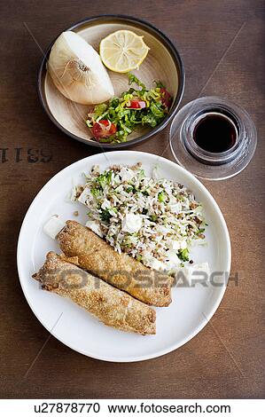 Plate of baked pastries with rice View Large Photo Image Stock Image - Plate of baked pastries with rice. Fotosearch