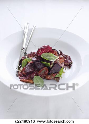 Plate of beetroot and radicchio salad View Large Photo Image Stock Photograph - Plate of beetroot and radicchio salad. Fotosearch
