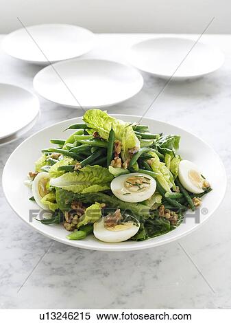 Stock Photography - Plate of green bean and walnut salad. Fotosearch