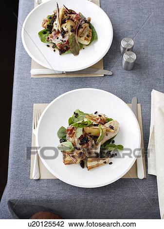Plate of pheasant with parsnip salad View Large Photo Image Stock Image - Plate of pheasant with parsnip salad. Fotosearch