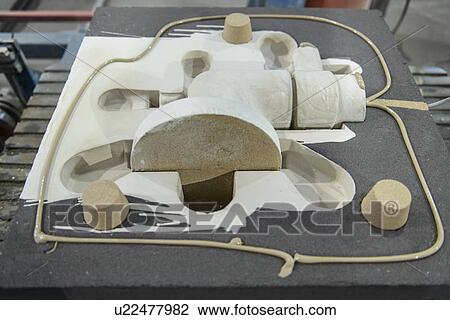 Stock Image - Sand mould in metal foundry. Fotosearch
