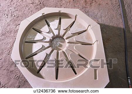 Stock Photograph - Sand mould in metal foundry. Fotosearch