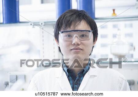Scientist working in lab View Large Photo Image Stock Photo - Scientist working in lab. Fotosearch