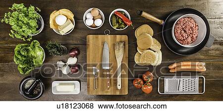 Stock Photo - Table laid with ingredients and utensils. Fotosearch