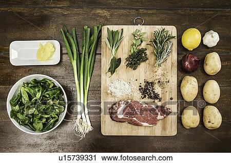Table with ingredients and seasonings View Large Photo Image Stock Image - Table with ingredients and seasonings. Fotosearch