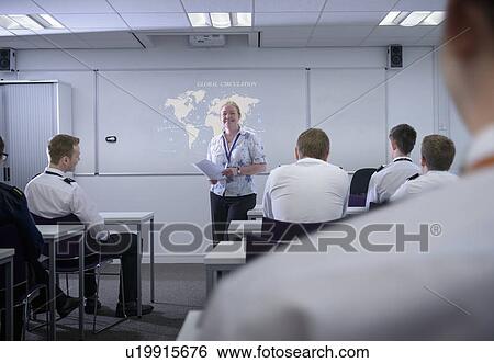 Teacher talking to shipping trainees View Large Photo Image Stock Photograph - Teacher talking to shipping trainees. Fotosearch