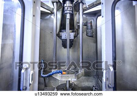 Water spraying on machinery in factory View Large Photo Image Stock Photo - Water spraying on machinery in factory. Fotosearch