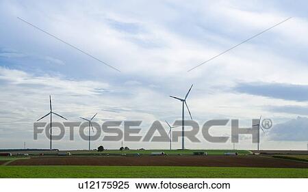 Wind turbines in rural landscape View Large Photo Image Stock Photography - Wind turbines in rural landscape. Fotosearch