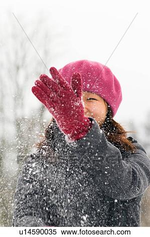 Woman playing in snow View Large Photo Image Stock Photography - Woman playing in snow. Fotosearch