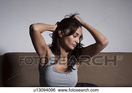 Woman yawning in bed View Large Photo Image Stock Photograph - Woman yawning in bed. Fotosearch
