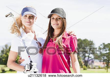 Women smiling together on golf course View Large Photo Image Stock Photo - Women smiling together on golf course. Fotosearch