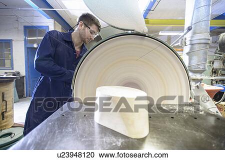 Worker making mould in foundry View Large Photo Image Stock Image - Worker making mould in foundry. Fotosearch