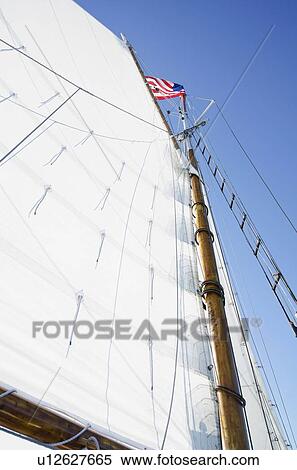 Stock Photography - American flag on mast. Fotosearch