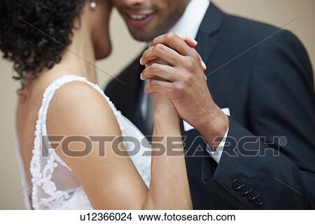 Picture - Bride and groom dancing. Fotosearch