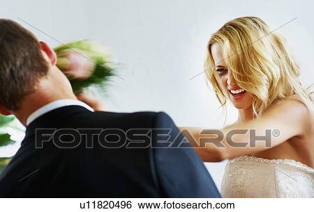 Stock Photograph - Bride slapping groom. Fotosearch