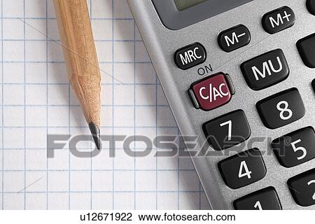 Calculator and pencil on graph paper, studio shot View Large Photo Image Stock Image - Calculator and pencil on graph paper, studio shot. Fotosearch