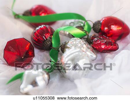 Christmas baubles wrapped in paper View Large Photo Image Stock Photo - Christmas baubles wrapped in paper. Fotosearch